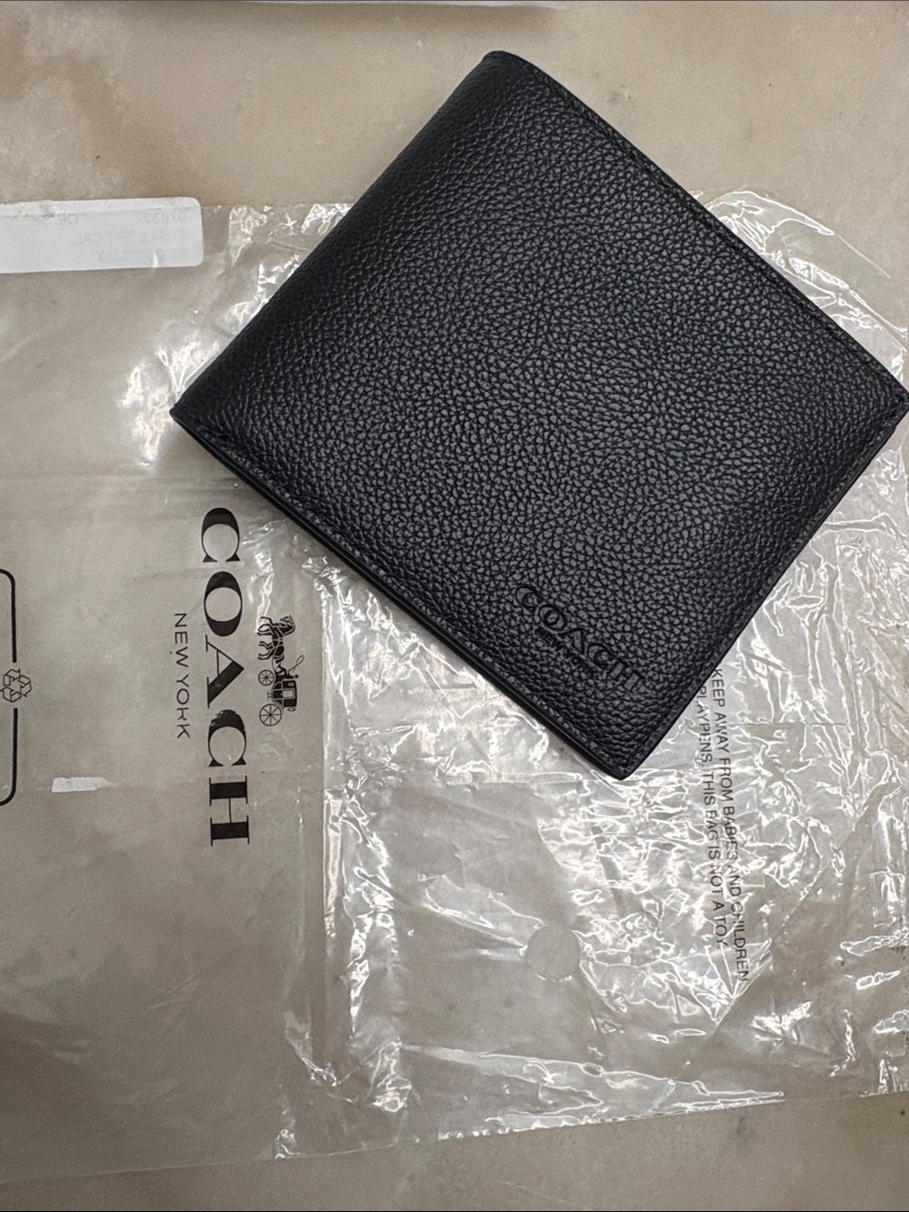 Coach Black Pebbled Leather Bi-Fold Card Wallet-opened to take photos never used